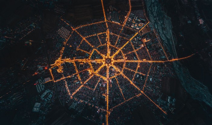 TEKES, CHINA - APRIL 03: Aerial view of the Tekes county in the shape of Bagua (Eight Trigrams), eight symbols used in Taoist cosmology, being illuminated at night on April 3, 2021 in Tekes County, Ili Kazakh Autonomous Prefecture, Xinjiang Uygur Autonomous Region of China. (Photo by VCG/VCG via Getty Images)