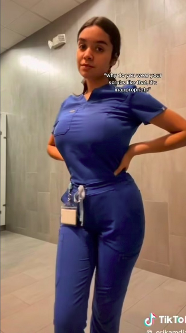 Seperti kebanyakan perawat, wanita itu memakai setelan berwarna biru. Tapi bajunya memang terlihat lebih ketat dibanding rekan-rekan seprofesi kebanyakan. Karena itu, seragamnya dianggap kurang pantas.Foto: TikTok @_erikamdiaz