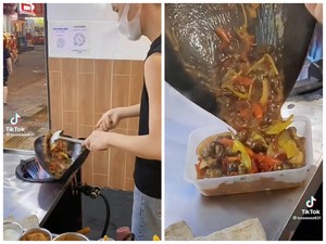 Tampil Beda, Pedagang Makanan Ini Masak dengan Wajan Penyok