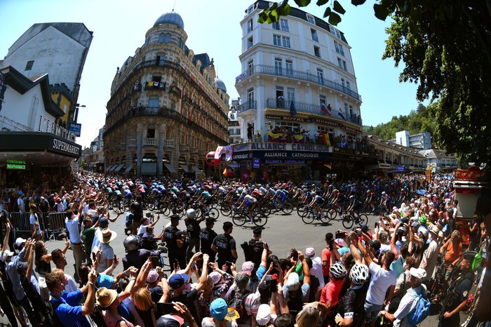 HAUTACAM, FRANCE - JULY 21: Tadej Pogacar of Slovenia and UAE Team Emirates - White Best Young Rider Jersey competes in the chase while fans cheer during the 109th Tour de France 2022, Stage 18 a 143,2km stage from Lourdes to Hautacam 1520m / #TDF2022 / #WorldTour / on July 21, 2022 in Hautacam, France. (Photo by Tim de Waele/Getty Images)