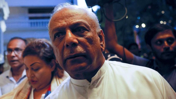 Dinesh Gunawardena, Leader of the House of Parliament arrives at a Buddhist temple as he waits for Ranil Wickremesinghe who has been elected as the Eighth Executive President under the Constitution, amid the countrys economic crisis, in Colombo, Sri Lanka July 20, 2022. REUTERS/ Dinuka Liyanawatte