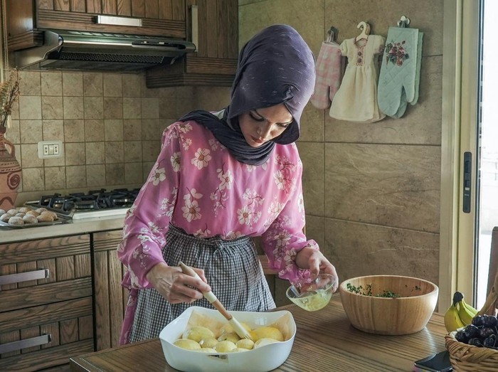 TikTok chef Abir El Saghir prepares a pastry dish at her kitchen in Jeb Jennin, west Bekaa, Lebanon June 30, 2022. REUTERS/Issam Abdallah