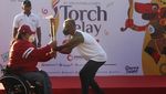 Momen Sandiaga Uno-Gibran Ramaikan Pawai Obor ASEAN Para Games