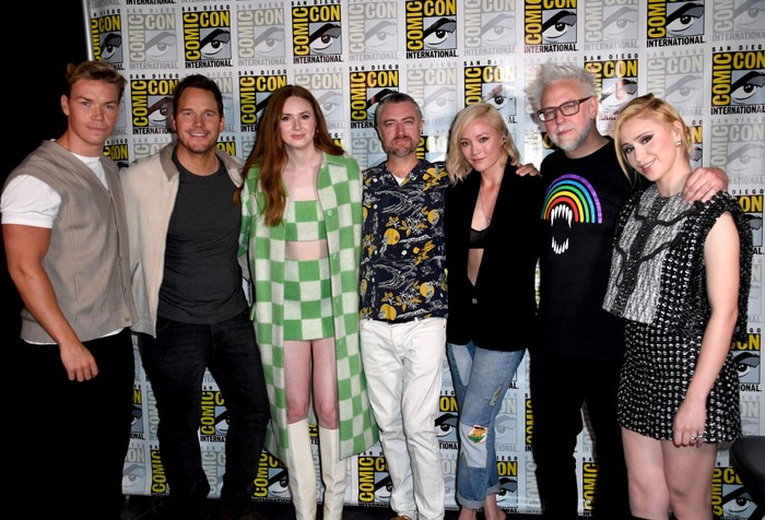 1410558068 SAN DIEGO, CALIFORNIA - JULY 23: (L-R) Will Poulter, Chris Pratt, Karen Gillan, Sean Gunn, Pom Klementieff, James Gunn, and Maria Bakalova attend the Marvel Cinematic Universe Mega-Panel during 2022 Comic Con International: San Diego at San Diego Convention Center on July 23, 2022 in San Diego, California. (Photo by Albert L. Ortega/Getty Images)