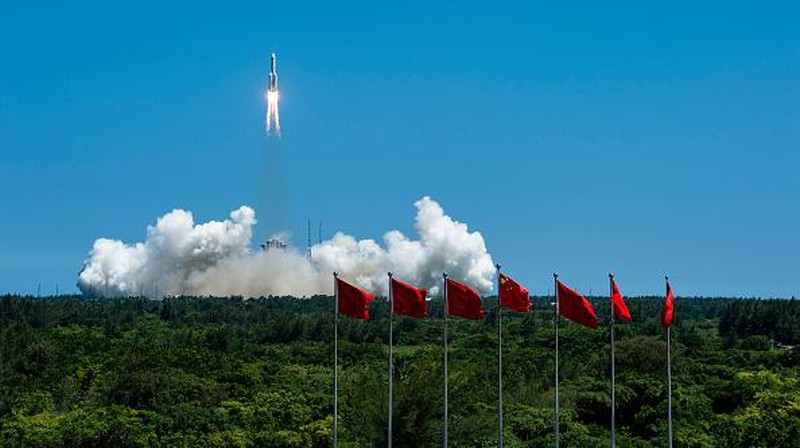 WENCHANG, CHINA - JULY 24: Spectators watch as a Long March-5B Y3 rocket carrying China's space station lab module Wentian blasts off from Wenchang Spacecraft Launch Site on July 24, 2022 in Wenchang, Hainan Province of China. (Photo by Luo Yunfei/China News Service via Getty Images)