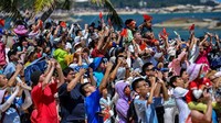 WENCHANG, CHINA - JULY 24: Spectators watch as a Long March-5B Y3 rocket carrying Chinas space station lab module Wentian blasts off from Wenchang Spacecraft Launch Site on July 24, 2022 in Wenchang, Hainan Province of China. (Photo by Luo Yunfei/China News Service via Getty Images)