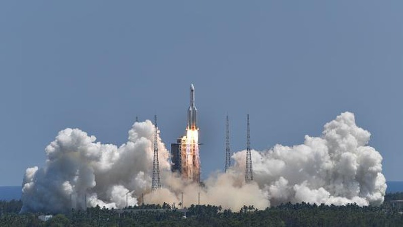 WENCHANG, CHINA - JULY 24: Spectators watch as a Long March-5B Y3 rocket carrying China's space station lab module Wentian blasts off from Wenchang Spacecraft Launch Site on July 24, 2022 in Wenchang, Hainan Province of China. (Photo by Luo Yunfei/China News Service via Getty Images)