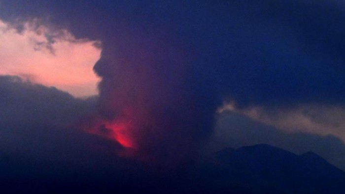 This long exposure image shows the eruption of volcano Sakurajima Sunday night, July 24, 2022, in the view from Tarumizu city, Japans southern prefecture of Kagoshima. Japan’s Meteorological Agency said a volcano on Japan’s southern main island of Kyushu erupted Sunday night, spewing ash and volcanic rocks, but there were no immediate reports of damage or injuries in nearby towns. (Kyodo News via AP)