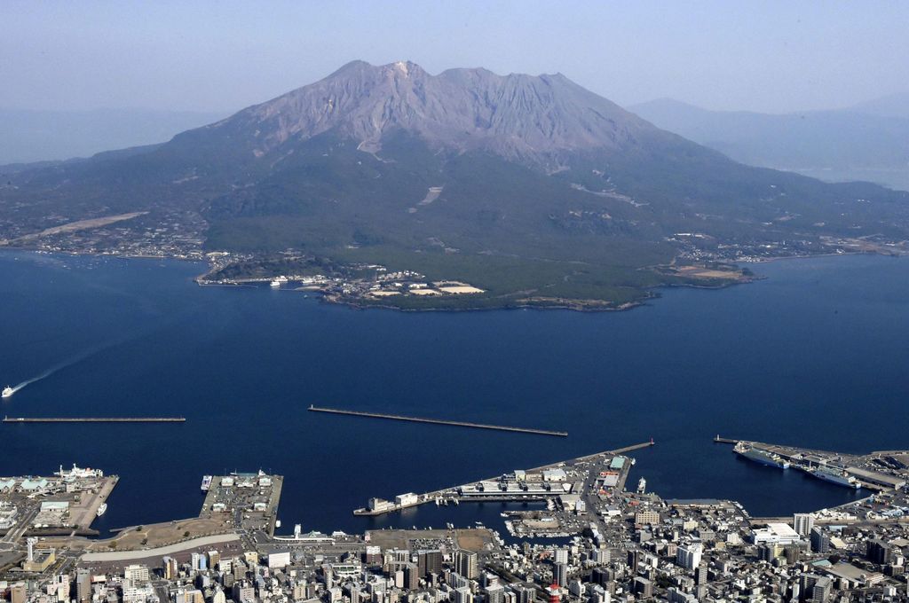 Ash from Sakurajima volcano is seen on a vehicle in Kagoshima, southern island of Kyushu, Japan Monday, July 25, 2022. The volcano erupted Sunday night, spewing ash and rocks, causing dozens of residents in nearby towns to evacuate to a safer part of the region. (Kyodo News via AP)