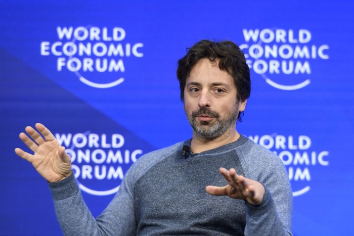 Google co-founder Sergey Brin gestures during a session of the World Economic Forum, on January 19, 2017 in Davos. (Photo by FABRICE COFFRINI / AFP) (Photo by FABRICE COFFRINI/AFP via Getty Images)