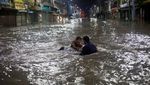 Karachi Banjir, Warga Kedinginan-Motor Pada Mogok