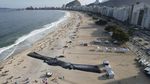 Seniman Ini Bikin Lukisan Raksasa di Pantai Rio de Janeiro