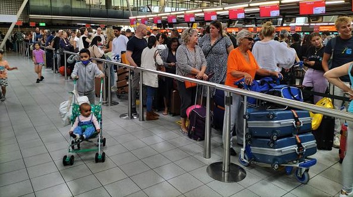 AMSTERDAM, NETHERLANDS - JULY 25: A view from Amsterdam Airport Schiphol on July 25, 2022 in Amsterdam, Netherlands. While the number of airport staff across Europe is decreasing, the rise in the number of passengers and flights continues to make the travel of international passengers to the region an ordeal. (Photo by Farouk Batiche/Anadolu Agency via Getty Images)