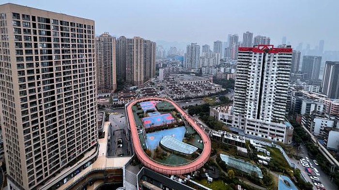 CHONGQING, CHINA - DECEMBER 8, 2021 - A sports stadium is seen on the roof of a shopping mall in Chongqing, China, on December 8, 2021. It is reported that the 