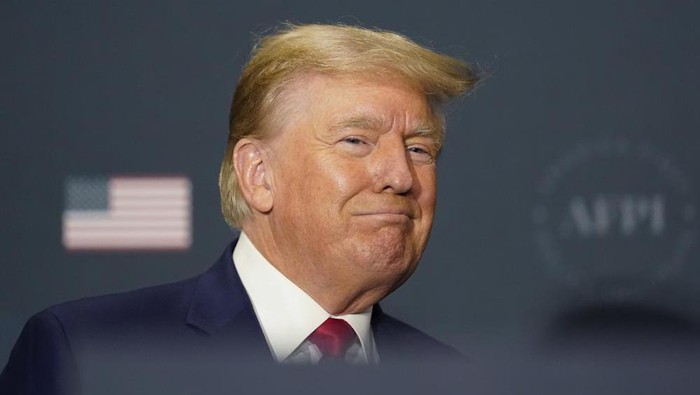 Former President Donald Trump arrives to speak at an America First Policy Institute agenda summit at the Marriott Marquis in Washington, Tuesday, July 26, 2022. (AP Photo/Andrew Harnik)