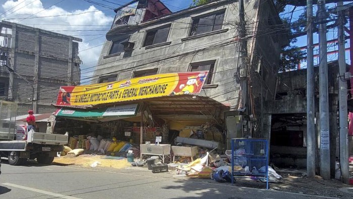 A damaged mason temple is seen after a strong quake hit Bangued, Abra province, northern Philippines on Wednesday July 27, 2022. A strong earthquake shook the northern Philippines on Wednesday, damaging buildings and prompting many people in the capital to run outdoors. (AP Photo)