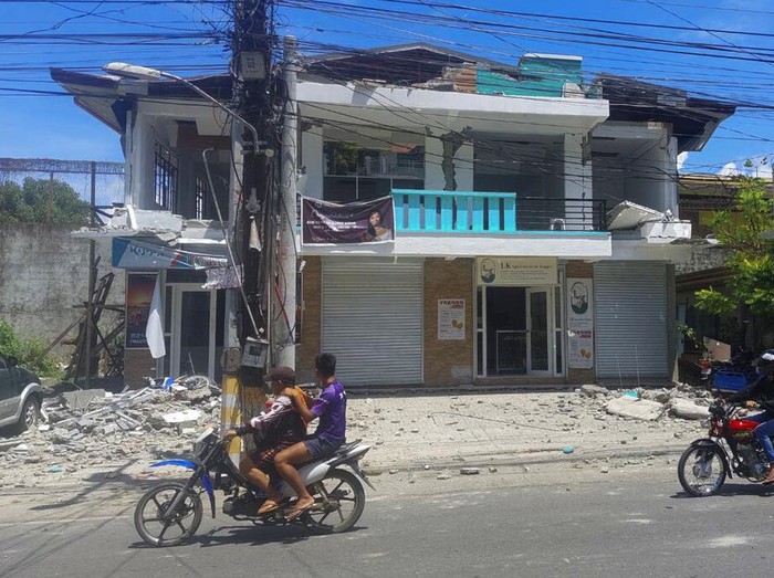A damaged mason temple is seen after a strong quake hit Bangued, Abra province, northern Philippines on Wednesday July 27, 2022. A strong earthquake shook the northern Philippines on Wednesday, damaging buildings and prompting many people in the capital to run outdoors. (AP Photo)