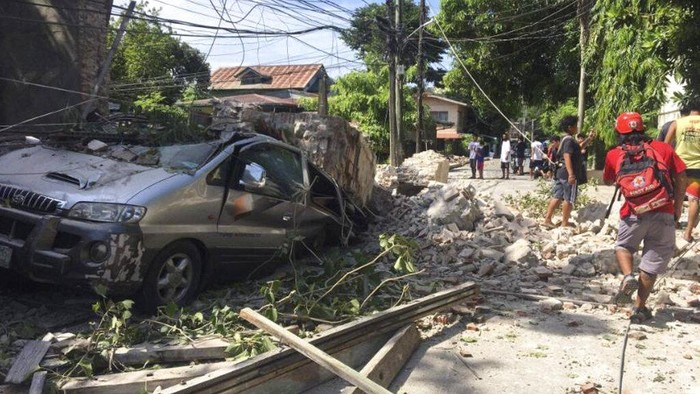 A damaged mason temple is seen after a strong quake hit Bangued, Abra province, northern Philippines on Wednesday July 27, 2022. A strong earthquake shook the northern Philippines on Wednesday, damaging buildings and prompting many people in the capital to run outdoors. (AP Photo)