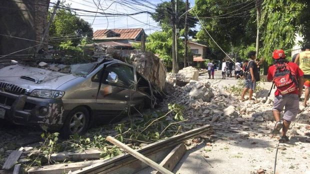 A damaged mason temple is seen after a strong quake hit Bangued, Abra province, northern Philippines on Wednesday July 27, 2022. A strong earthquake shook the northern Philippines on Wednesday, damaging buildings and prompting many people in the capital to run outdoors. (AP Photo)