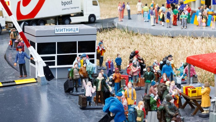 Miniatur Pengungsi Ukraina Miniature models depict European Commission President Ursula von der Leyen shaking hands with Ukraine's President Volodymyr Zelenskiy, surrounded by people with European and Ukrainian flags celebrating outside the Independence Monument in Kyiv's Maidan Square, at The