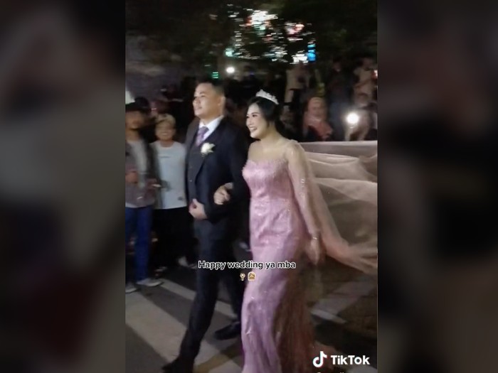 Pasangan pengantin viral Rendy Satria Darma Hutabarat dan Vania Gita Nainggolan.