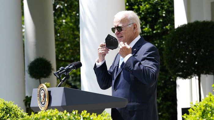 President Joe Biden waves as he leaves after speaking in the Rose Garden of the White House in Washington, Wednesday, July 27, 2022. Biden ended his COVID-19 isolation after testing negative for the virus on Tuesday night and again on Wednesday. (AP Photo/Susan Walsh)