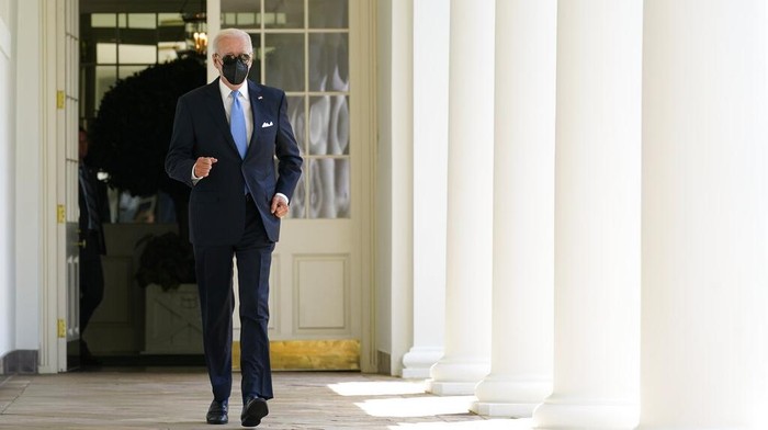 President Joe Biden waves as he leaves after speaking in the Rose Garden of the White House in Washington, Wednesday, July 27, 2022. Biden ended his COVID-19 isolation after testing negative for the virus on Tuesday night and again on Wednesday. (AP Photo/Susan Walsh)