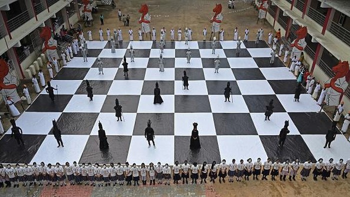 Children dressed as chess pieces perform during an event organised ahead of the 44th Chess Olympiad 2022, in Chennai on July 26, 2022. (Photo by Arun SANKAR / AFP) (Photo by ARUN SANKAR/AFP via Getty Images)