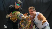 Masyarakat umum di kota New York belum lama ini rela seluruh bagian tubuhnya dicat untuk merayakan NYC Body Painting Day. Foto: Getty Images/Alexi Rosenfeld