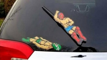 Superhero lagi nyantai di kaca mobil nih..