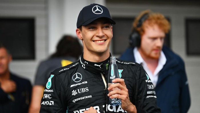 BUDAPEST, HUNGARY - JULY 30: Pole position qualifier George Russell of Great Britain and Mercedes celebrates in parc ferme during qualifying ahead of the F1 Grand Prix of Hungary at Hungaroring on July 30, 2022 in Budapest, Hungary. (Photo by Dan Mullan/Getty Images)