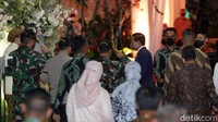Jokowi hadir dengan didampingi istrinya, Iriana.