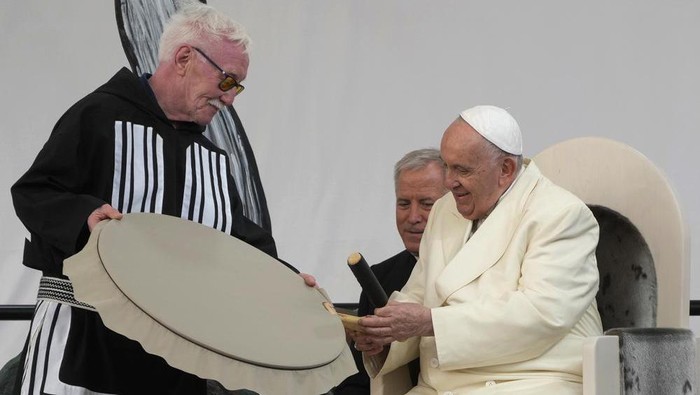 Pope Francis meets young people and elders at Nakasuk Elementary School Square in Iqaluit, Canada, Friday, July 29, 2022. Pope Francis travels to chilly Iqaluit, capital of northern Nunavut, to meet with Inuit Indigenous people, including school children and survivors of residential schools, in his final day in Canada. (AP Photo/Gregorio Borgia)