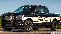 Pick up listrik ini dibangun dengan basis pick up Ford F-150 yang legendaris. Kendati hadir dengan teknologi canggih ala mobil listrik, desain yang tangguh dari F-150 masih terasa kental di F-150 Lightning Pro SSV ini. Foto: dok. Ford