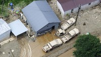 Korban akibat banjir di Kentucky, Amerika Serikat bertambah. Hingga saat ini korban tewas menjadi 25 orang. Michael Clevenger/Courier Journal via AP.