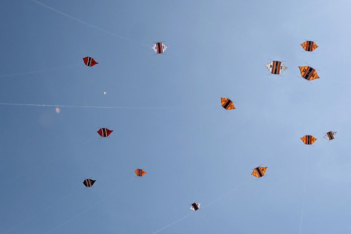 People fly their kites during the Kite Festival at Mertasari beach in Sanur on the Indonesian resort island of Bali on July 31, 2022. (Photo by SONNY TUMBELAKA / AFP) (Photo by SONNY TUMBELAKA/AFP via Getty Images)