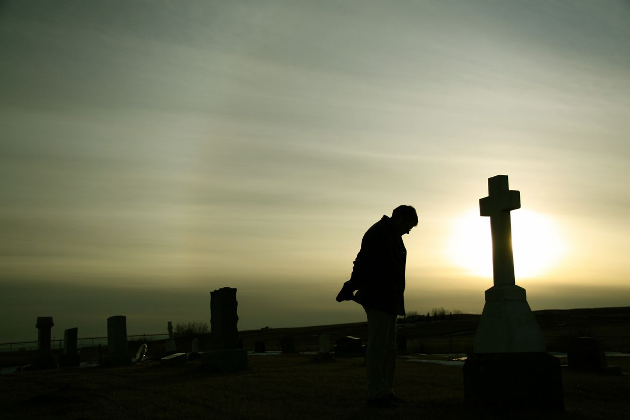 Angel guardian sleeping on the grave
