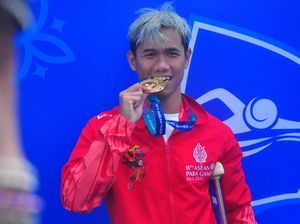 Pecahkan 3 Rekor, Jendi Pangabean Borong 3 Emas Para Renang
