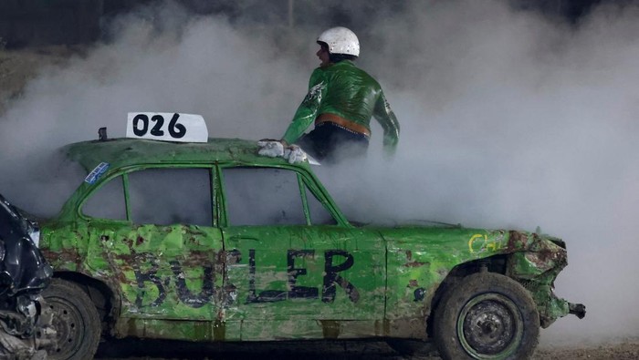 Drivers take part in a car demolition derby organised by the Cars and Motorcycles Sport Association (Malta) to raise funds for the Puttinu Cares children's cancer support group in Ta' Qali, Malta, July 30, 2022. REUTERS/Darrin Zammit Lupi