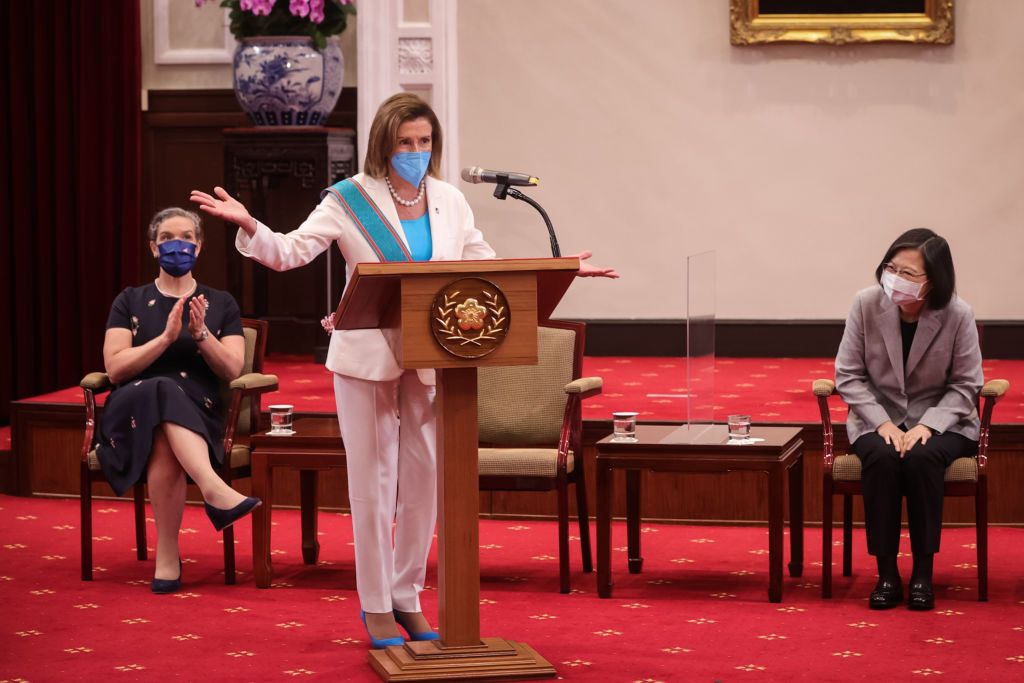 TAIPEI, TAIWAN - AUGUST 03: Speaker of the U.S. House Of Representatives Nancy Pelosi (D-CA), center, speaks after receiving the Order of Propitious Clouds with Special Grand Cordon, Taiwan's highest civilian honour, from Taiwan's President Tsai Ing-wen, right, at the president's office on August 03, 2022 in Taipei, Taiwan. Pelosi arrived in Taiwan on Tuesday as part of a tour of Asia aimed at reassuring allies in the region, as China made it clear that her visit to Taiwan would be seen in a negative light. (Photo by Chien Chih-Hung/Office of The President via Getty Images)