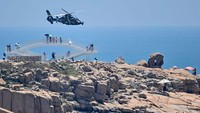 Seperti dilansir AFP, Kamis (4/8/2022), media pemerintah China melaporkan latihan militer besar-besaran itu dimulai pukul 12.00 waktu setempat. AFP/Hector Retamal.