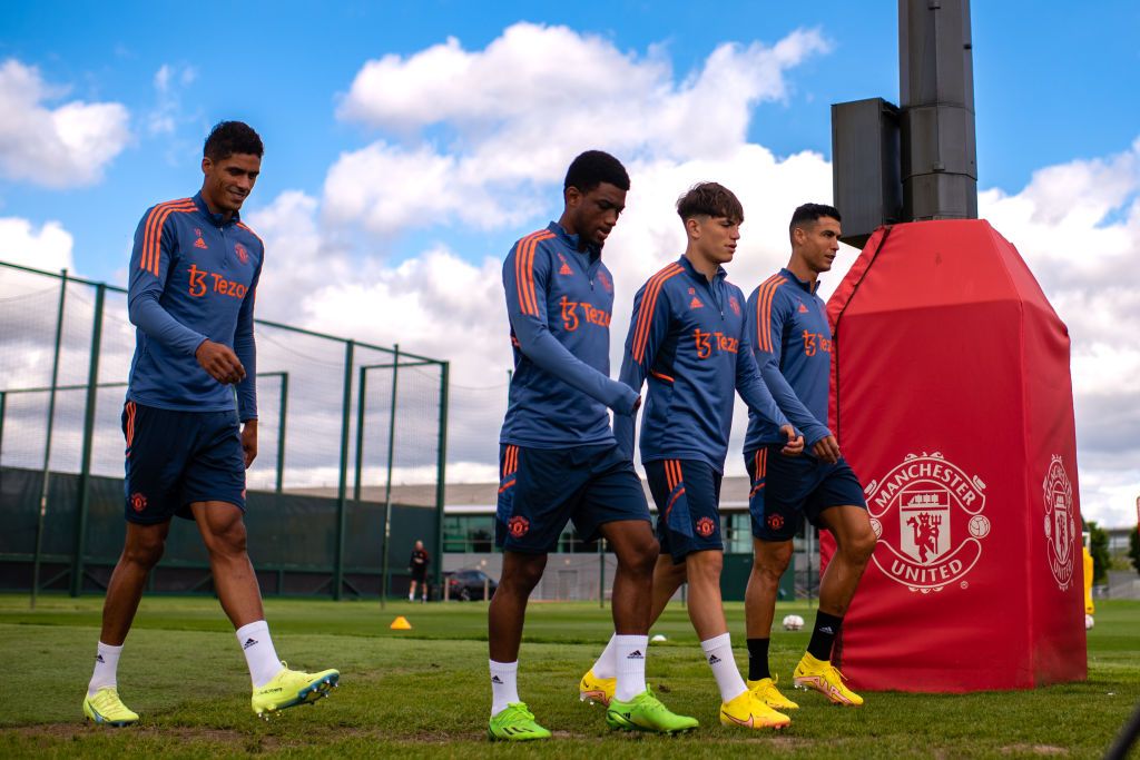 MANCHESTER, ENGLAND - AUGUST 03: (EXCLUSIVE COVERAGE) Amad, Alejandro Garnacho, Cristiano Ronaldo of Manchester United in action during a first team training session at Carrington Training Ground on August 03, 2022 in Manchester, England. (Photo by Ash Donelon/Manchester United via Getty Images)