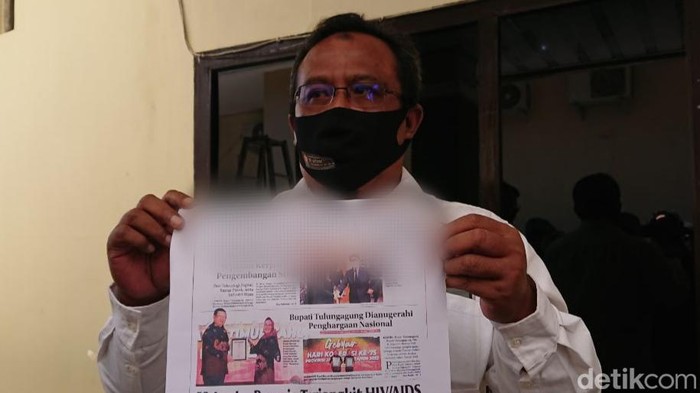 Hasil editan foto yang dimuat di media cetak terlapor