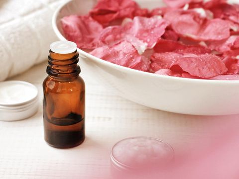 Aromatic body care at-home spa. Natural flower blur effect, pastel toned.