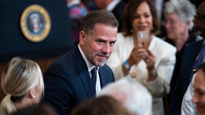 UNITED STATES - JULY 7: Hunter Biden, left, the son of President Joe Biden, his wife Melissa Cohen, and former Sen. Joe Lieberman, I-Conn., attend a ceremony to present the Presidential Medal of Freedom, the nations highest civilian honor, to 17 recipients at the White House on Thursday, July 7, 2022. (Tom Williams/CQ-Roll Call, Inc via Getty Images)