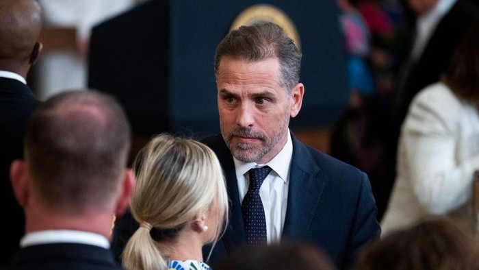 UNITED STATES - JULY 7: Hunter Biden, left, the son of President Joe Biden, his wife Melissa Cohen, and former Sen. Joe Lieberman, I-Conn., attend a ceremony to present the Presidential Medal of Freedom, the nations highest civilian honor, to 17 recipients at the White House on Thursday, July 7, 2022. (Tom Williams/CQ-Roll Call, Inc via Getty Images)