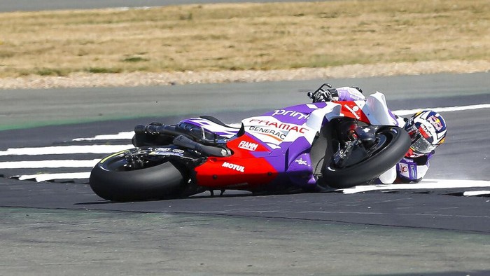 Johann Zarco Johann Zarco crashes out on his Prima Pramac Racing bike while leading, during the MotoGP race at the British Motorcycle Grand Prix at the Silverstone racetrack, in Towcester, England, Sunday, Aug. 7, 2022. (Barrington Coombs via AP)