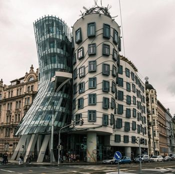 1242331420 View of The Dancing House is a deconstructivist building from Nationale-Nederlanden, designed by the Croatian-Czech architect Vlado Miluni in collaboration with Frank Gehry facing the Vltava river. The building was designed in 1992. in Prague, Czech Republic, on August 5, 2022. (Photo by Oscar Gonzalez/NurPhoto via Getty Images)