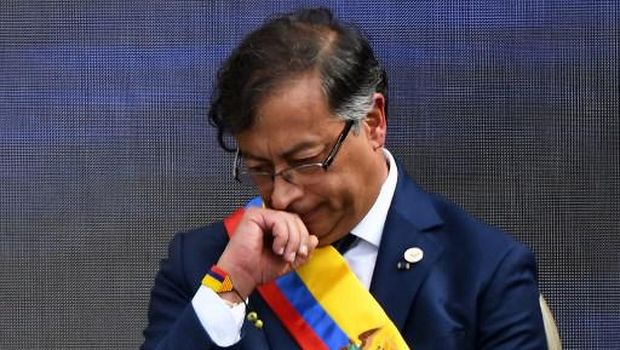 Colombia's new President Gustavo Petro gestures during the inauguration ceremony at the Bolivar square in Bogota, on August 7, 2022. - Ex-guerrilla and former mayor Gustavo Petro was sworn in as Colombia's first-ever leftist president, with plans for profound reforms in a country beset by economic inequality and drug violence. (Photo by JUAN BARRETO / AFP)
