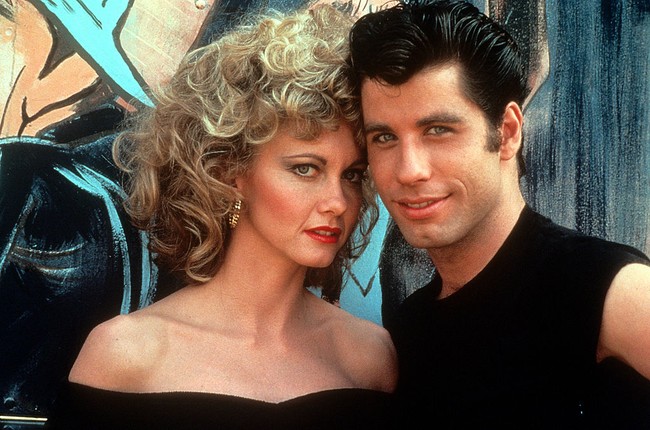 Olivia Newton-John meraih popularitas setelah memerankan Sandy di film ‘Grease’ yang rilis pada 1978. Di film tersebut, dia beradu akting dengan John Travolta. Foto: Michael Ochs Archives/Getty Images